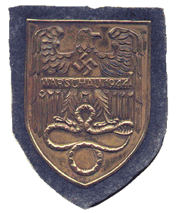 Odznaka, którą planowano wręczać niemieckim żołnierzom uczestniczącym w tłumieniu powstania warszawskiego.  Fabryka, która miała produkować odznaczenie nie przetrwała nalotu i żaden z żołnierzy nie został nią odznaczony –  